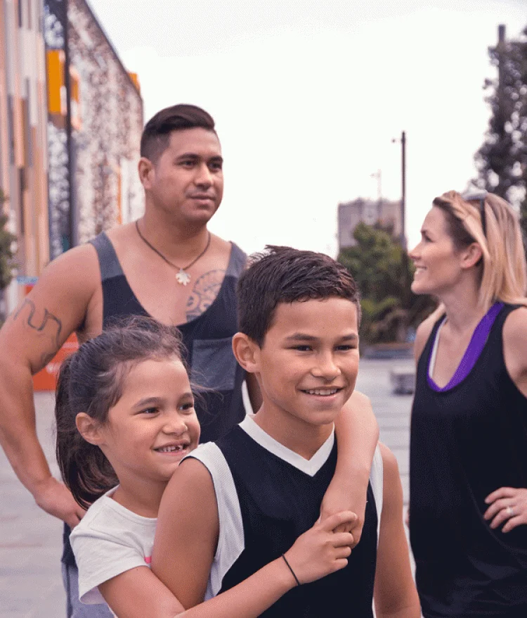 Young family of 4 at Wynyard Quarter, Auckland (stock image)