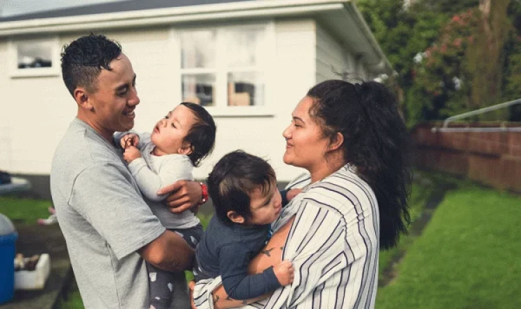 Happy and healthy young family of 4 of Maori or Pasifika descent