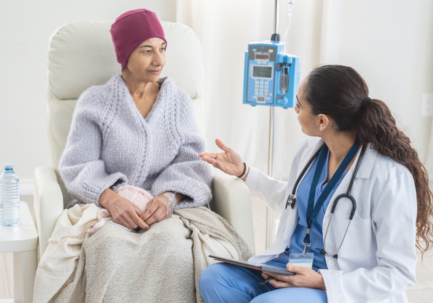 Oncologist speaking with patient (stock image)