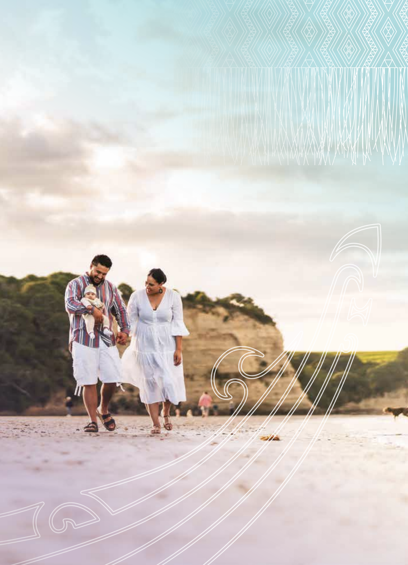 Family walking on beach