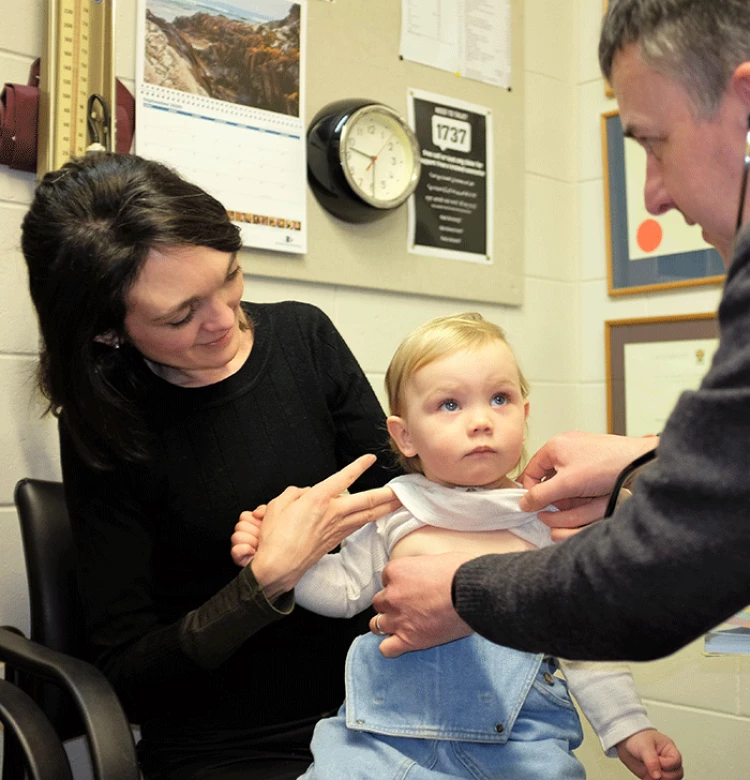 doctor with mother and toddler portrait